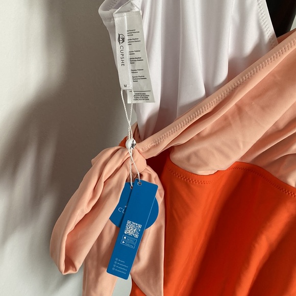 Orange brand new swimsuit. - Picture 3 of 5